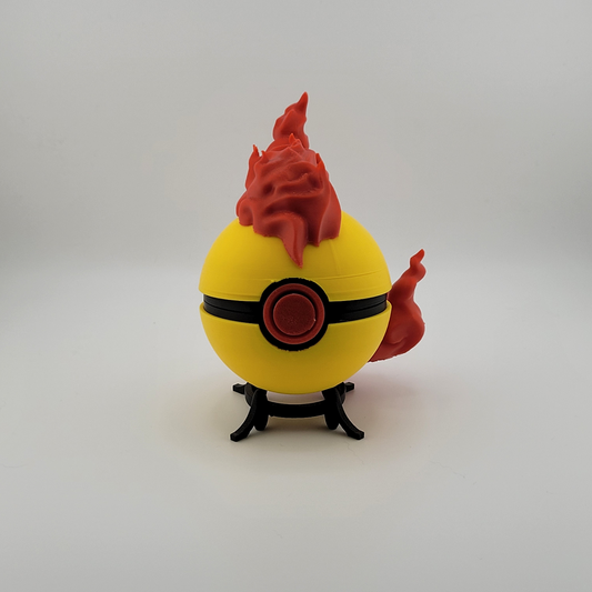 Moltres Pokeball toy with red flame design, pre-order available.