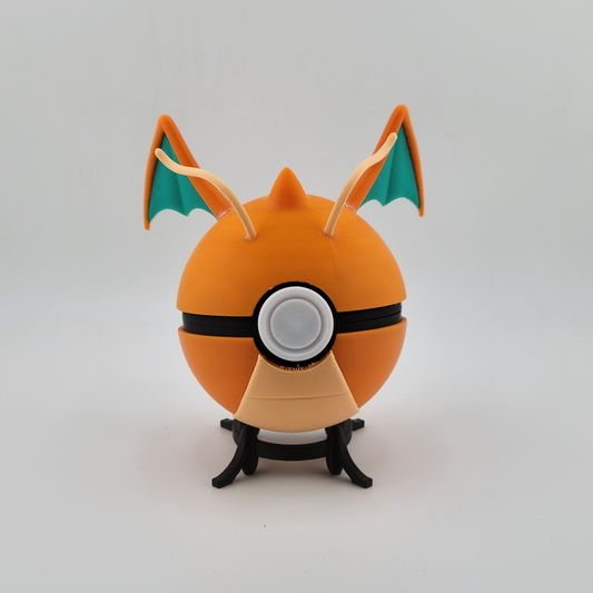 Dragonite Ball with orange and green detailing on display.