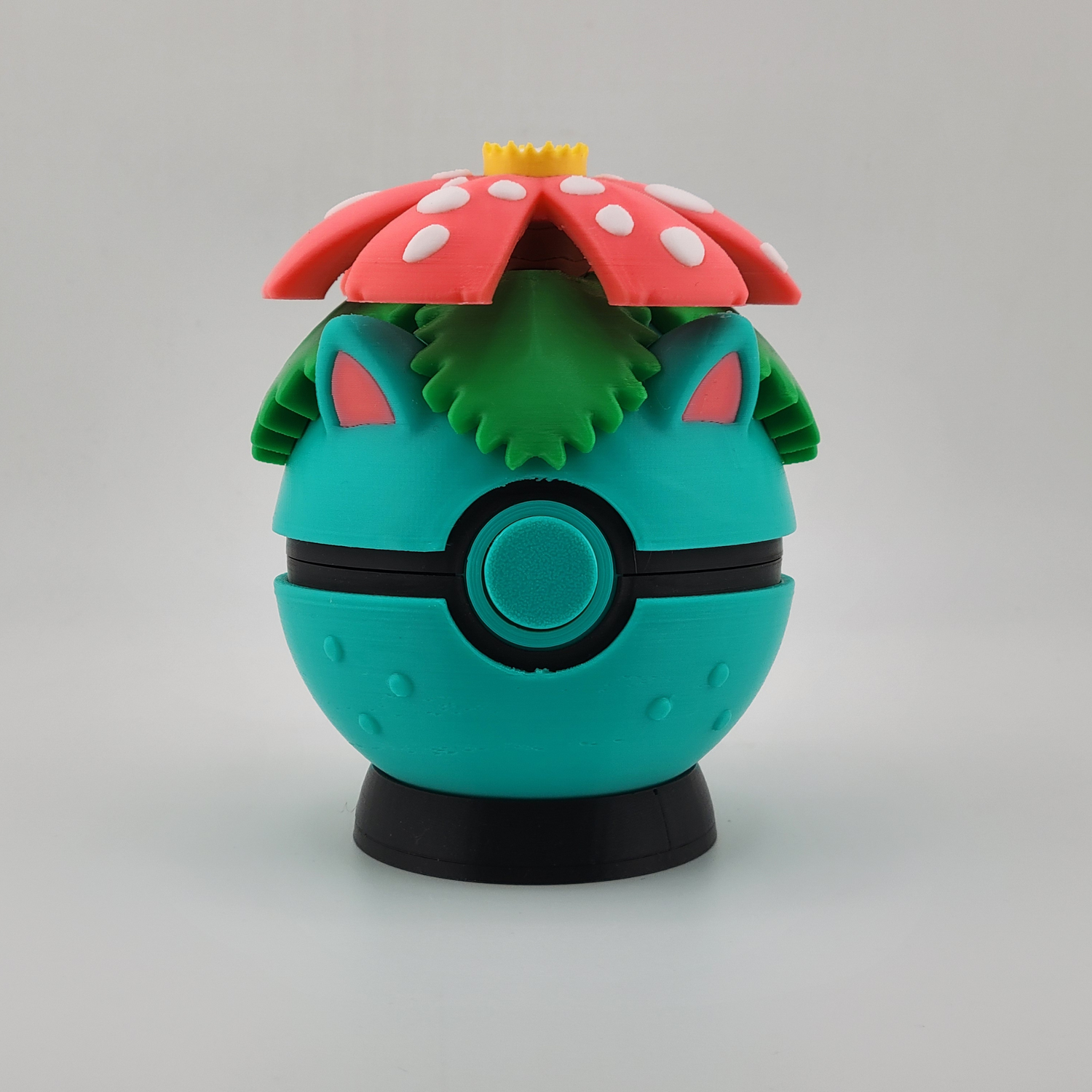 Venusaur-themed 3D printed Poké Ball with tropical flower design.