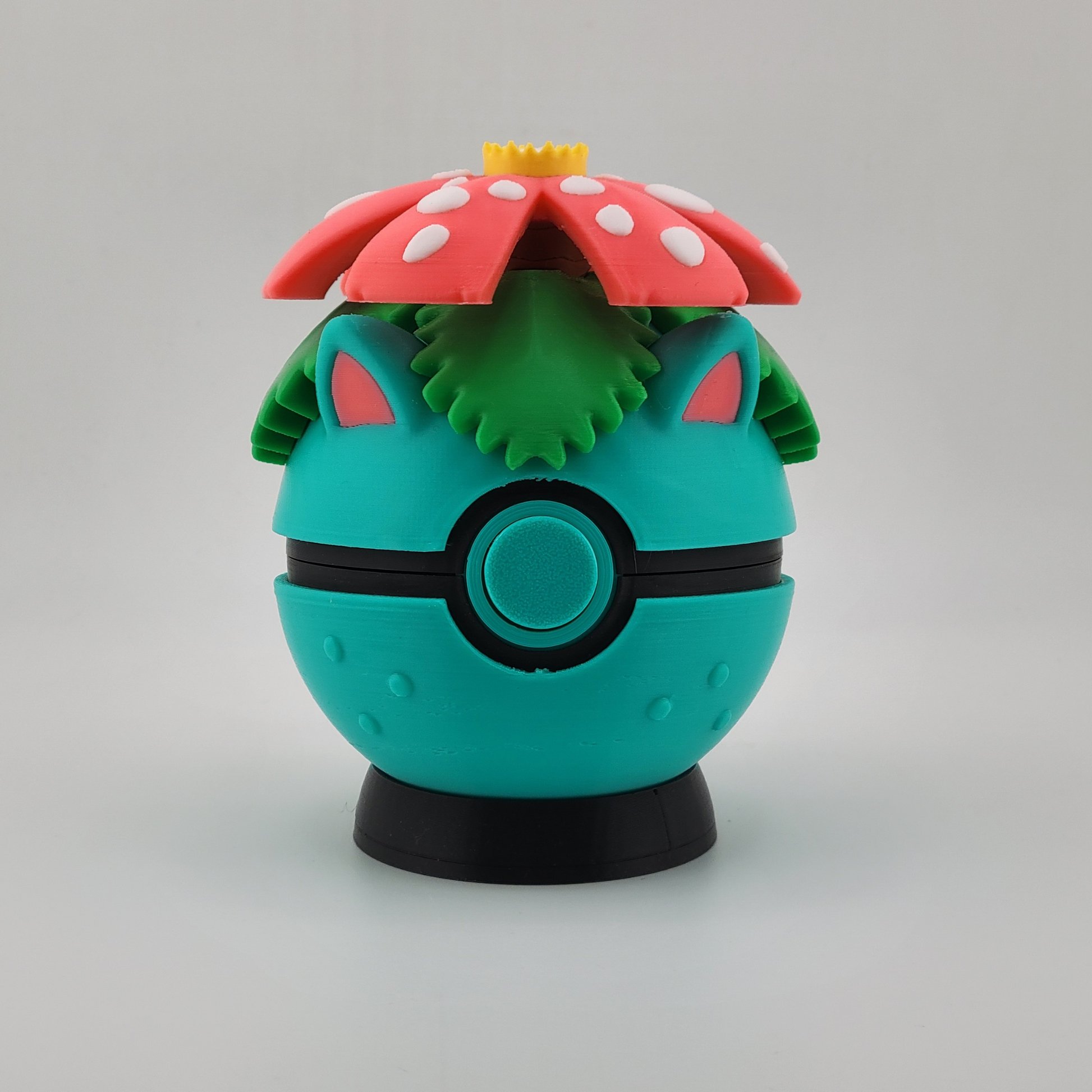 Venusaur-themed 3D printed Poké Ball with tropical flower design.