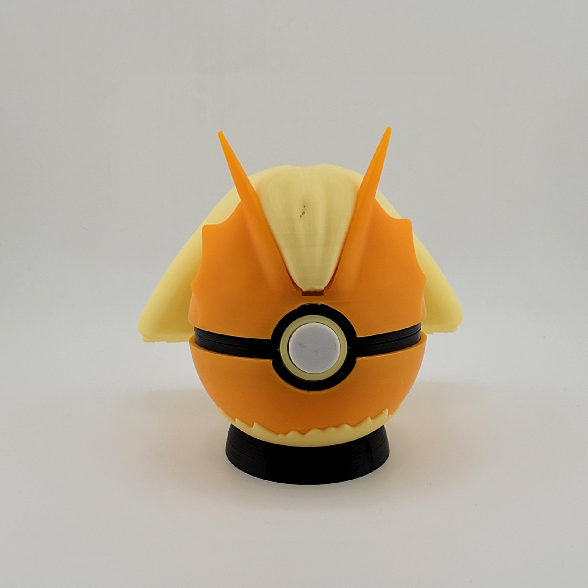 Blaziken Pokeball 3D printed toy on display.
