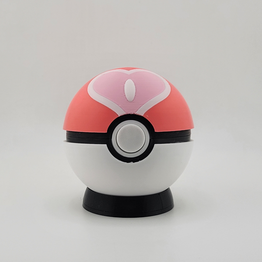 3D printed Loveball in pink and white with heart design.