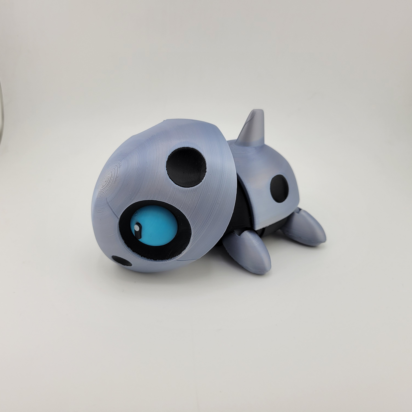 Highly detailed Articulated Aron Pokémon toy with articulated limbs, showing steel and rock-type design for dynamic poses.