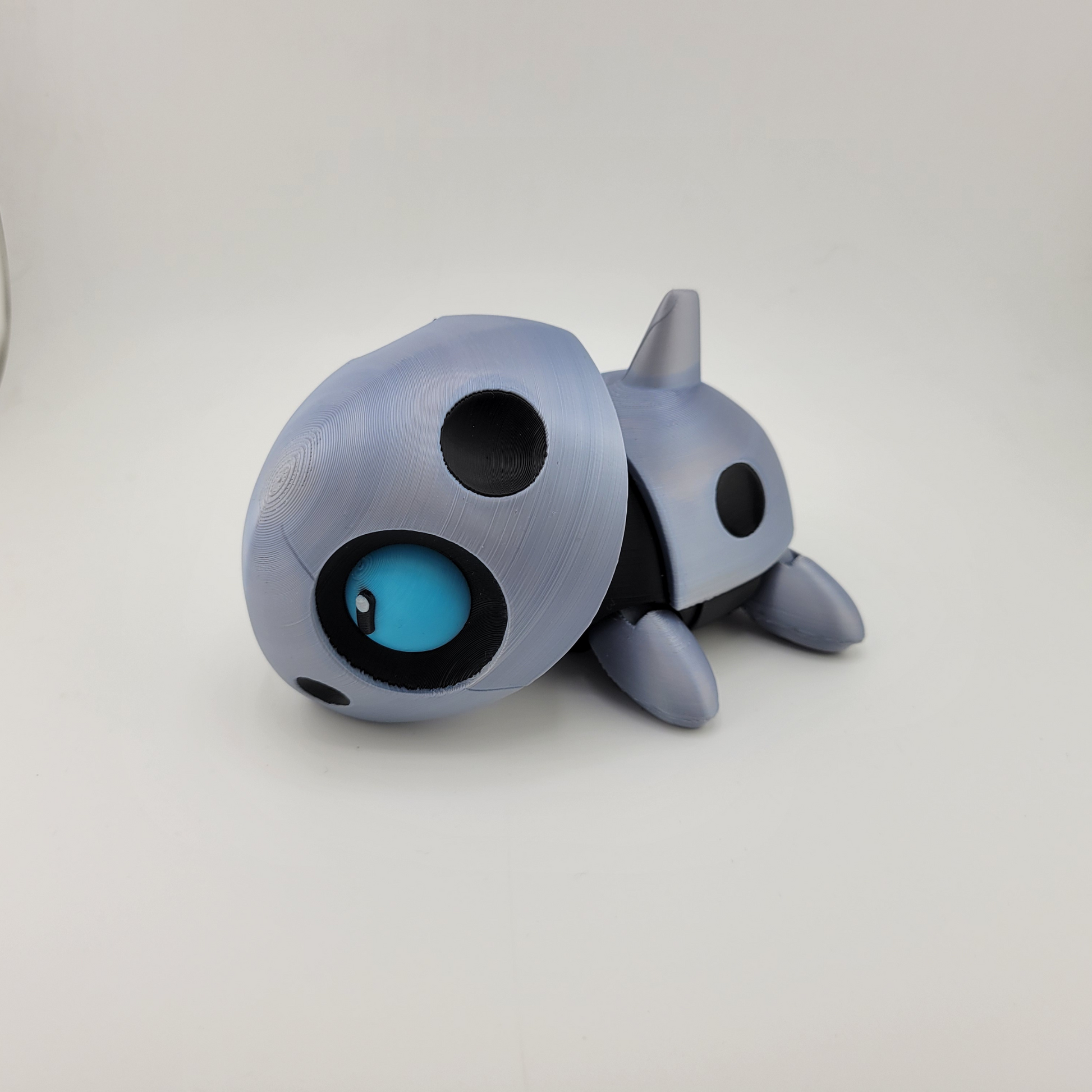 Highly detailed Articulated Aron Pokémon toy with articulated limbs, showing steel and rock-type design for dynamic poses.