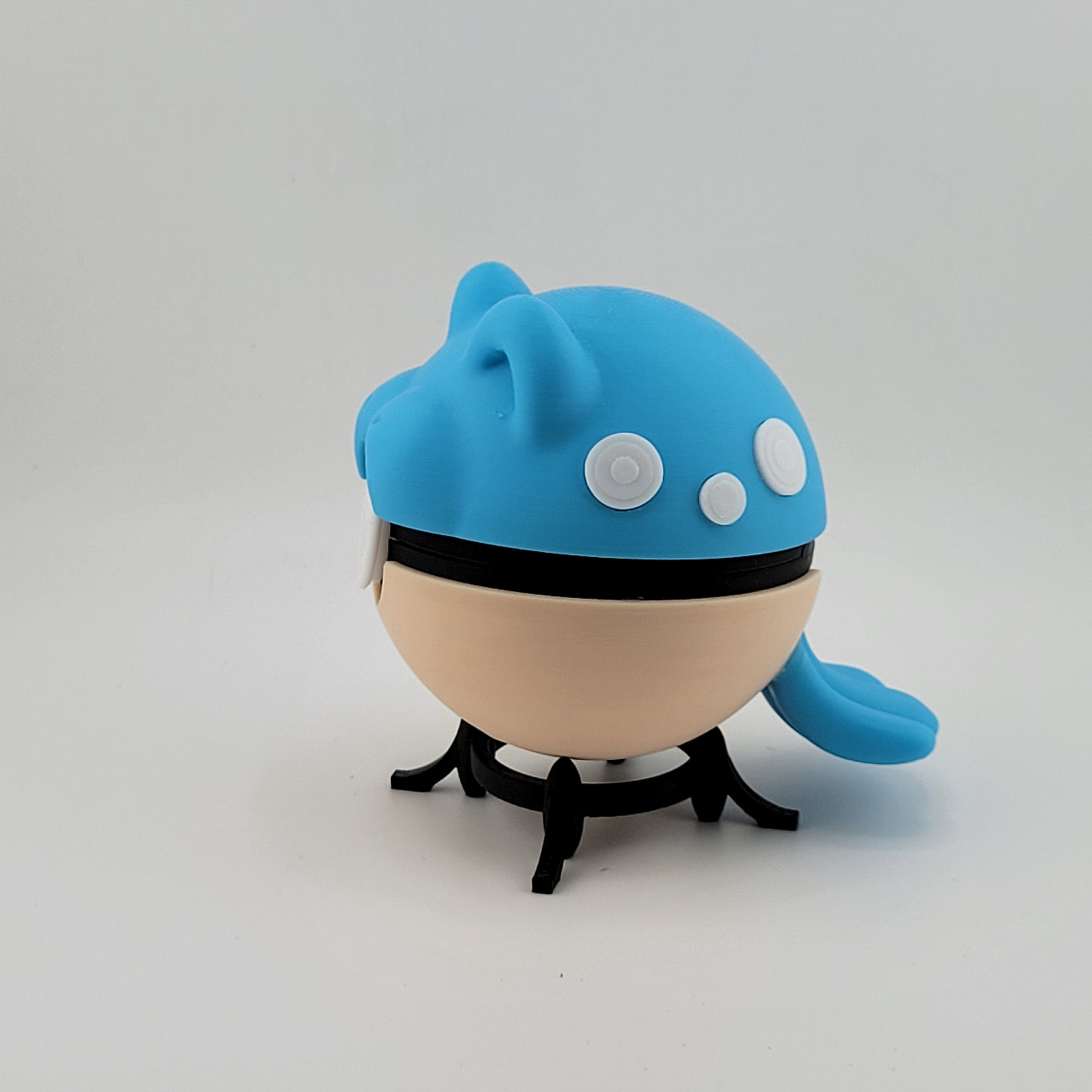 Spheal Pokeball 3D printed collectible on display stand, inspired by Pokémon, made of durable PLA plastic.