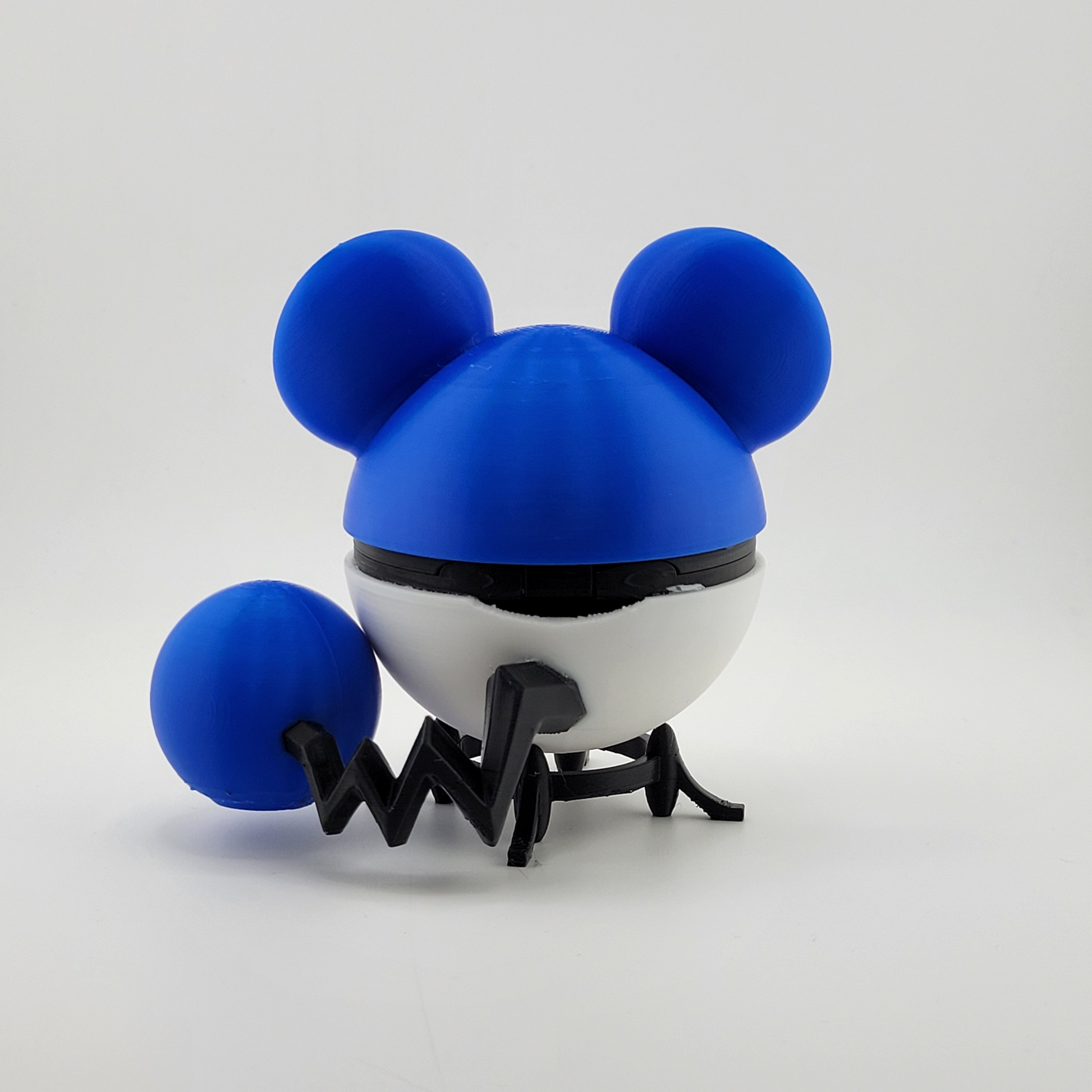 Marill Poké Ball with blue round ears and zigzag tail design.