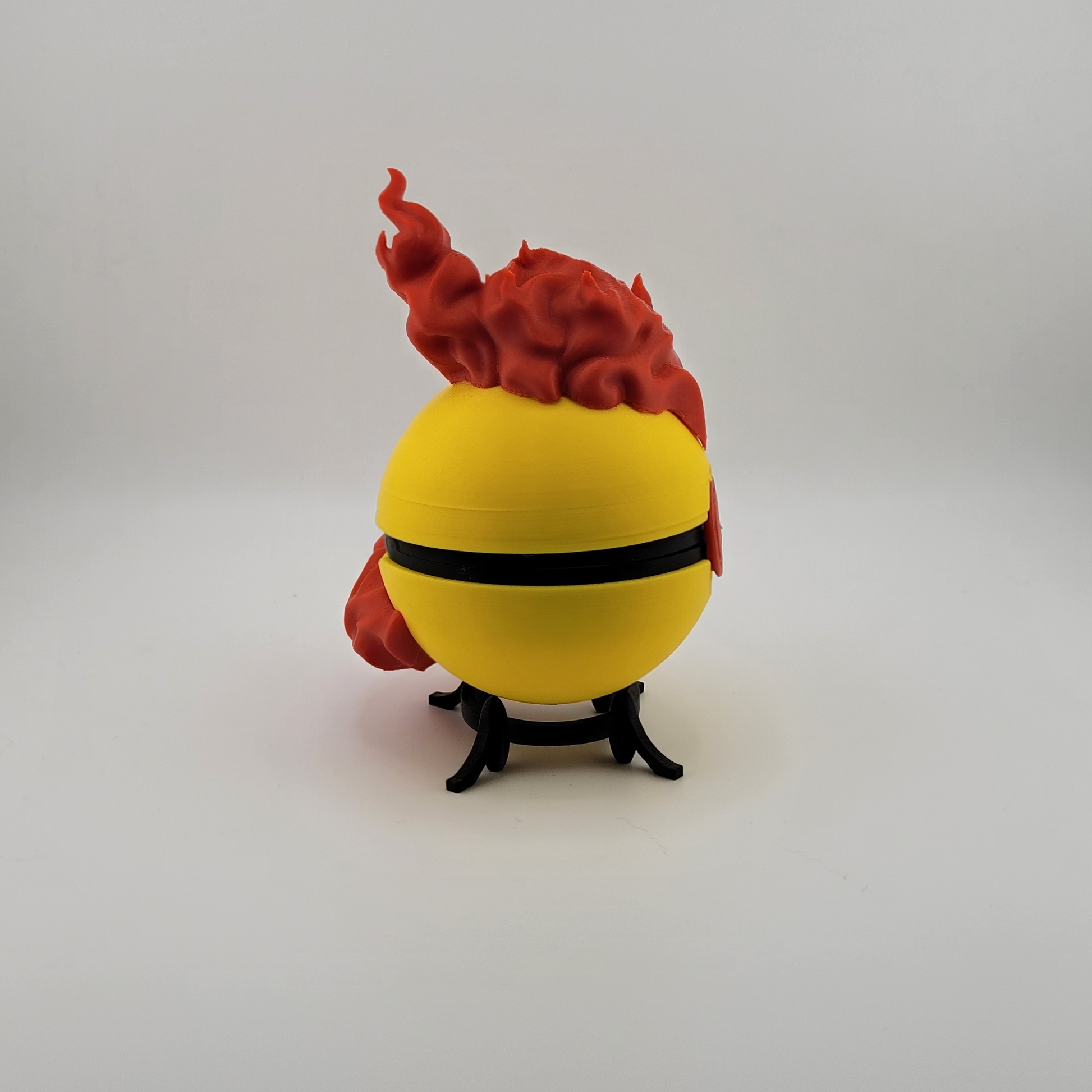 Moltres Pokeball 3D printed collectible with fiery detail.