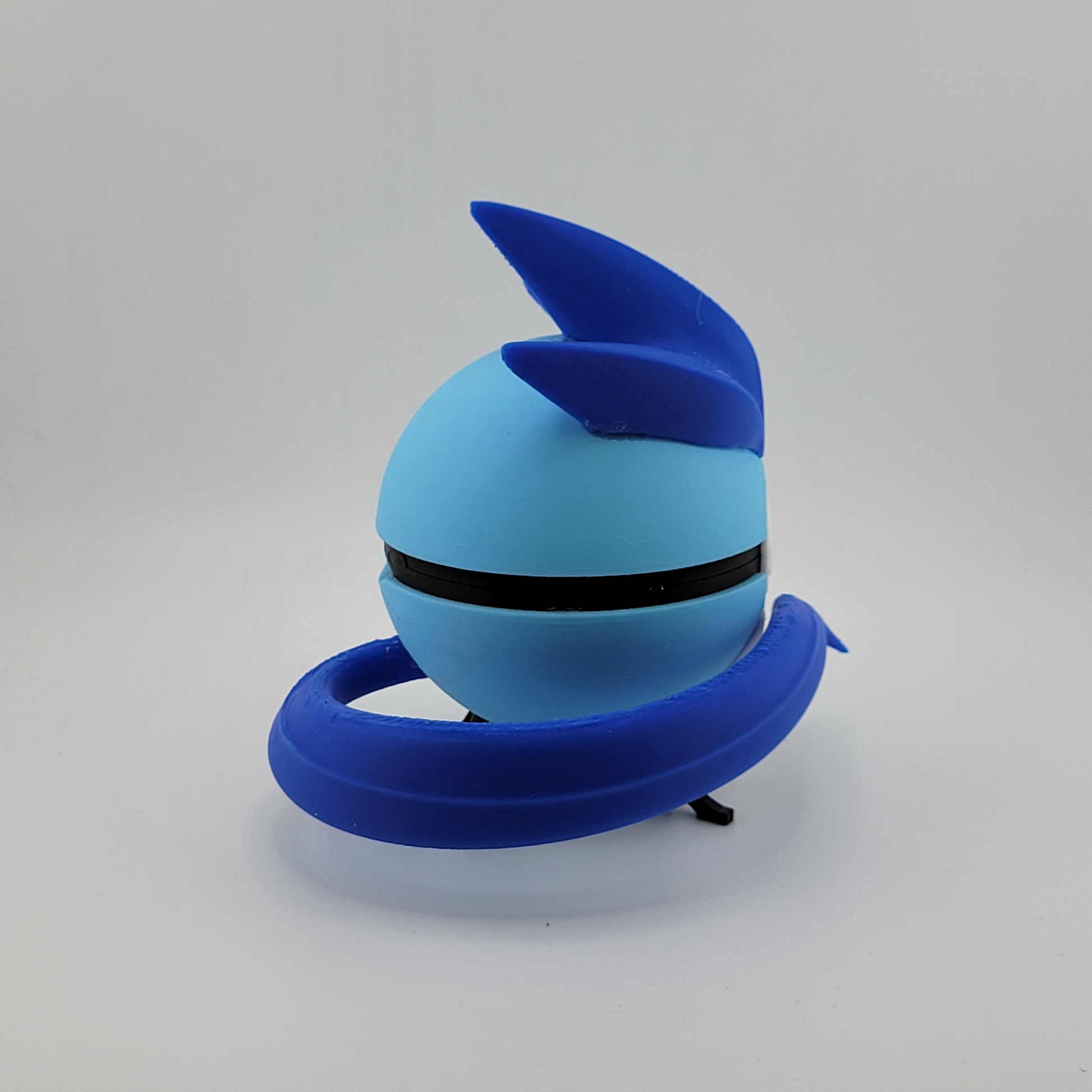 Blue and light blue Articuno-themed 3D printed Pokeball with detailed design and detachable top fin and tail ring.