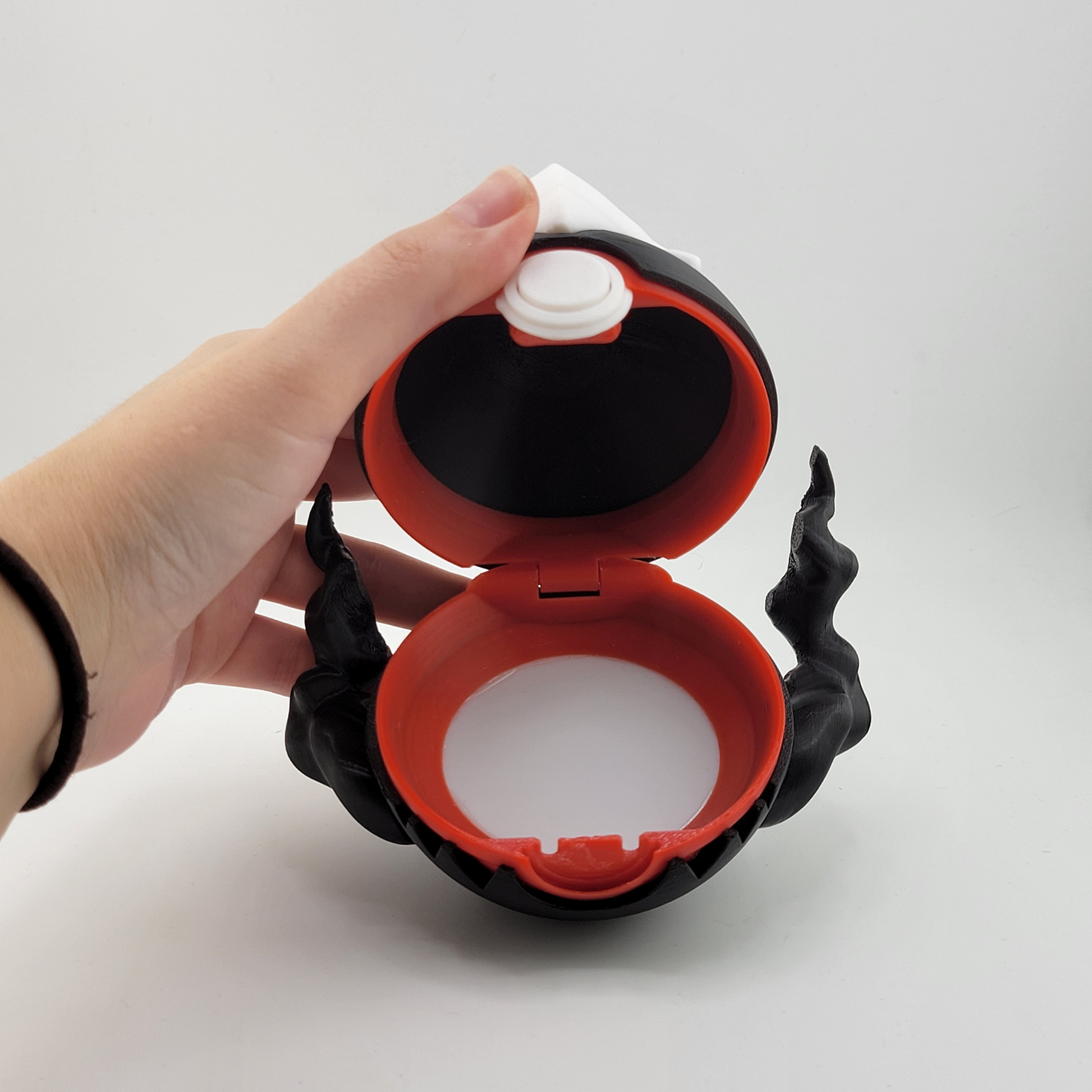 Darkrai-themed Pokeball, open with red interior, handcrafted with black, durable PLA plastic.