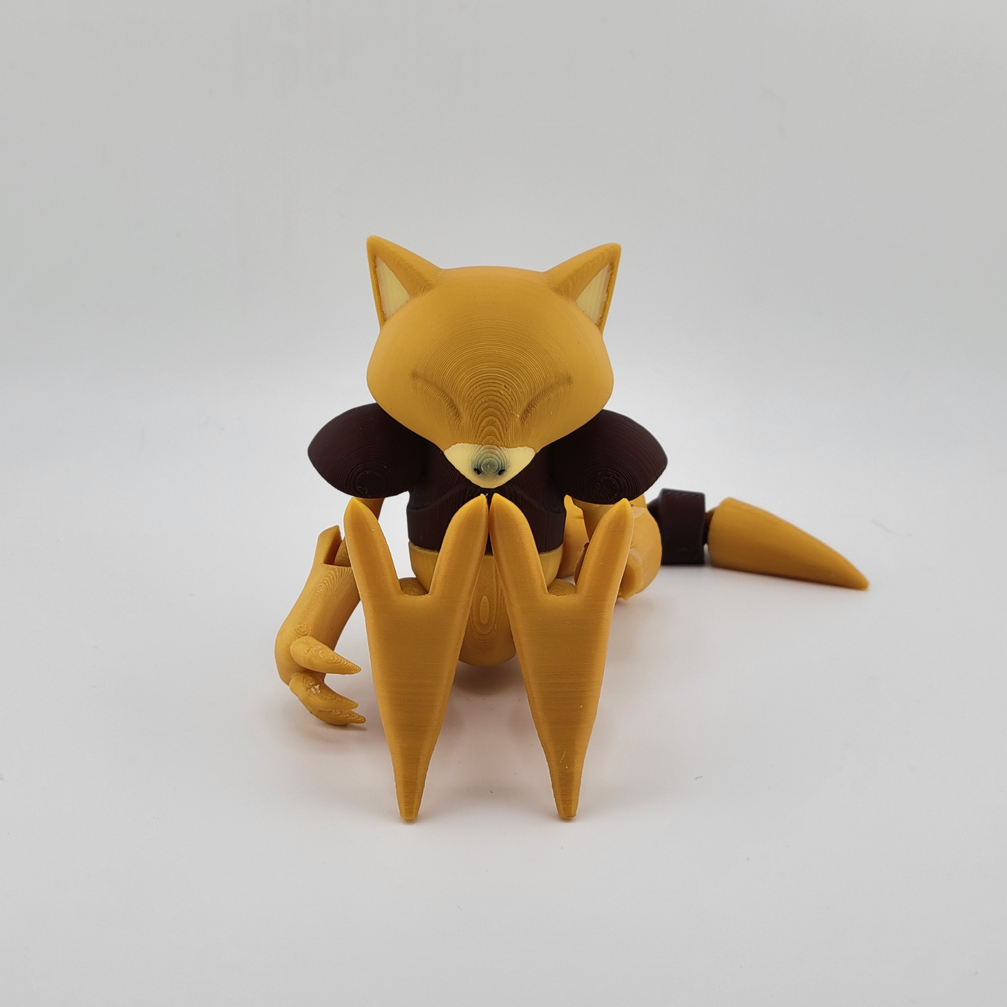Abra 3D printed model with teleportation powers, posed on a white background.