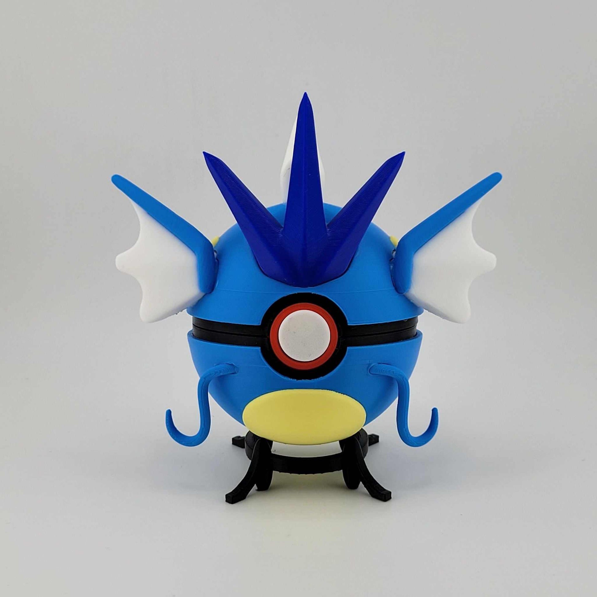 3D printed Gyarados Pokeball with blue spikes and fins, handcrafted from durable PLA plastic, inspired by Pokémon's Gyarados design.