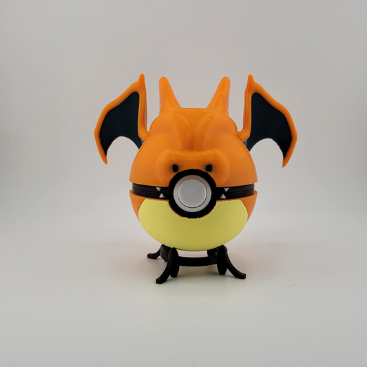 Charizard Pokeball 3D printed toy with fire-type design on display stand.
