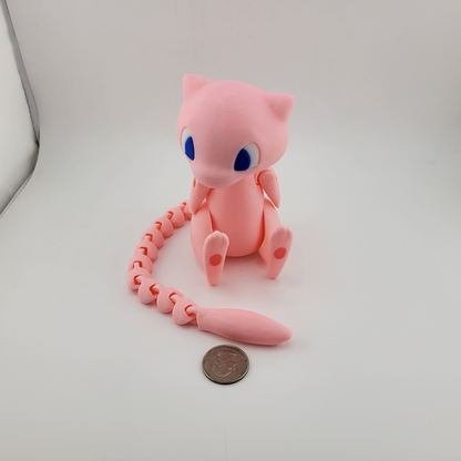3D printed articulated Mew figure for Pokémon fans, showcasing dynamic poses and meticulous detail.