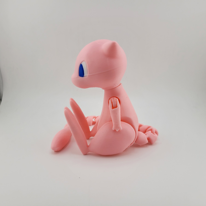 3D printed articulated Mew figure for Pokémon fans, showcasing dynamic poses and meticulous detail.