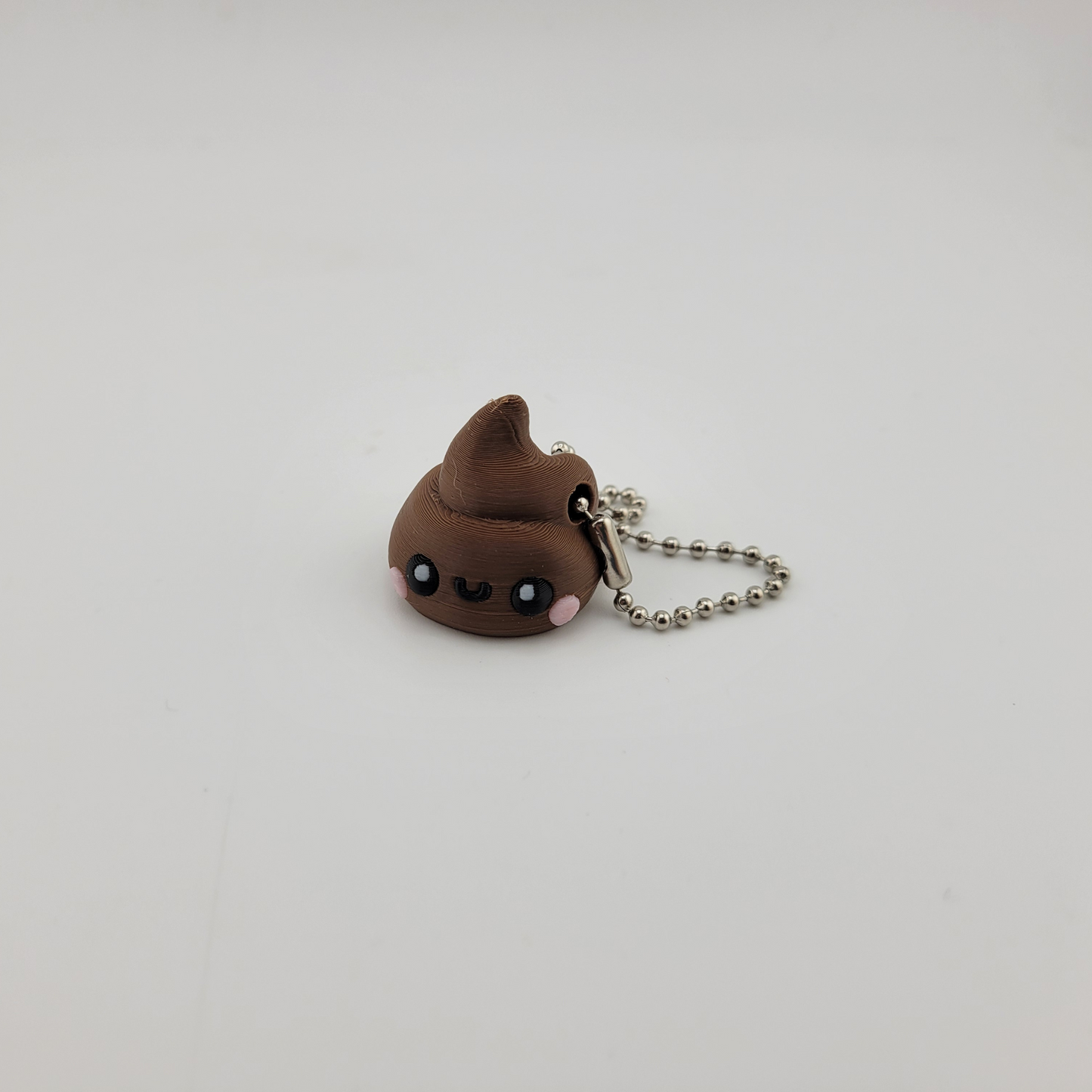 Toilet Paper and Poop Keychains