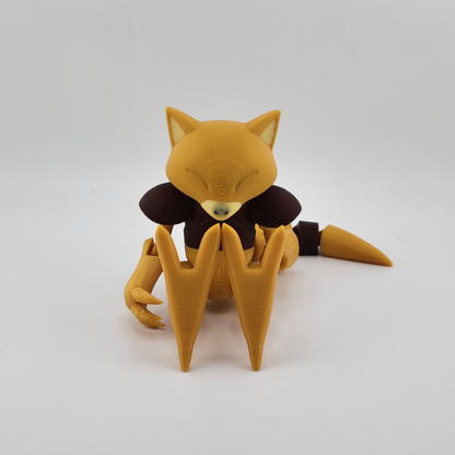 Abra 3D printed model with teleportation powers, posed on a white background.