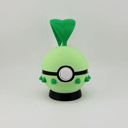 3D printed Chikorita Pokeball with leaf details and functional latch, designed as a nature-inspired Pokémon collectible.