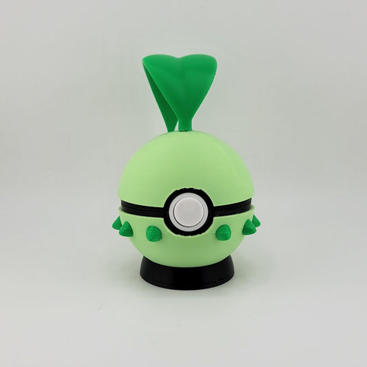 3D printed Chikorita Pokeball with leaf details and functional latch, designed as a nature-inspired Pokémon collectible.