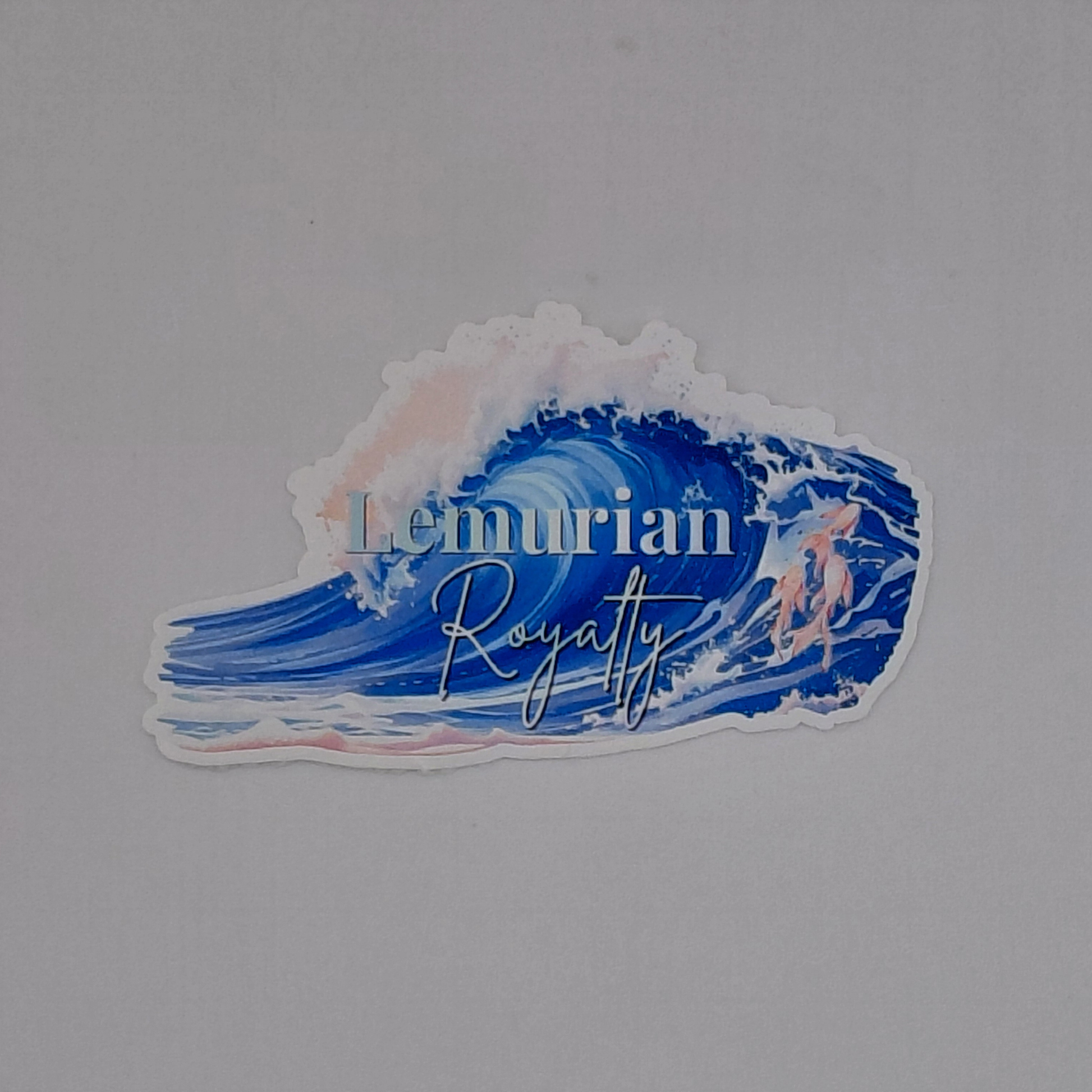 Love and Deepspace Rafayel Lemurian Royalty vinyl sticker featuring a large ocean wave in shades of blue with soft pink accents and elegant typography. Anime-inspired waterproof decal perfect for laptops, water bottles, journals, gaming accessories, and otome game collections. Aesthetic ocean-themed sticker designed for fans of Rafayel and Love and Deepspace.