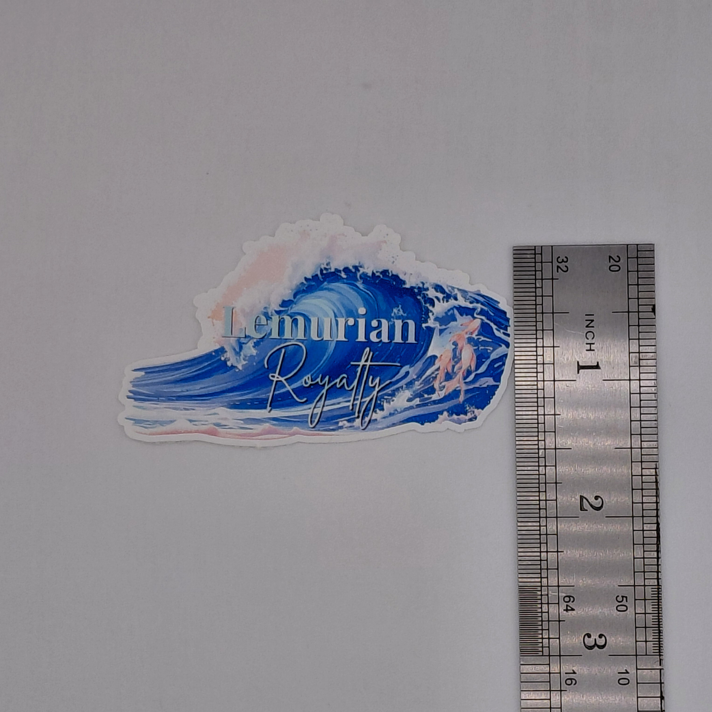 Love and Deepspace Rafayel Lemurian Royalty vinyl sticker featuring a large ocean wave in shades of blue with soft pink accents and elegant typography. Anime-inspired waterproof decal perfect for laptops, water bottles, journals, gaming accessories, and otome game collections. Aesthetic ocean-themed sticker designed for fans of Rafayel and Love and Deepspace.