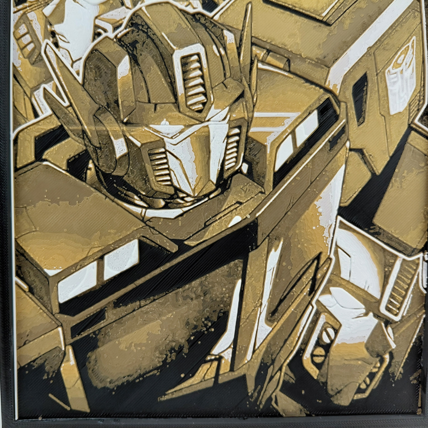Layered 3D printed Optimus Prime wall art inspired by a classic Transformers comic cover. Created using Chroma Canvas technology with textured depth, lightweight PLA construction, black frame, and gold, black, and white color palette. Can be displayed on a desk using the built-in stand or hung on a wall. Ideal for Transformers collectors, comic fans, gaming rooms, and nerd office décor.